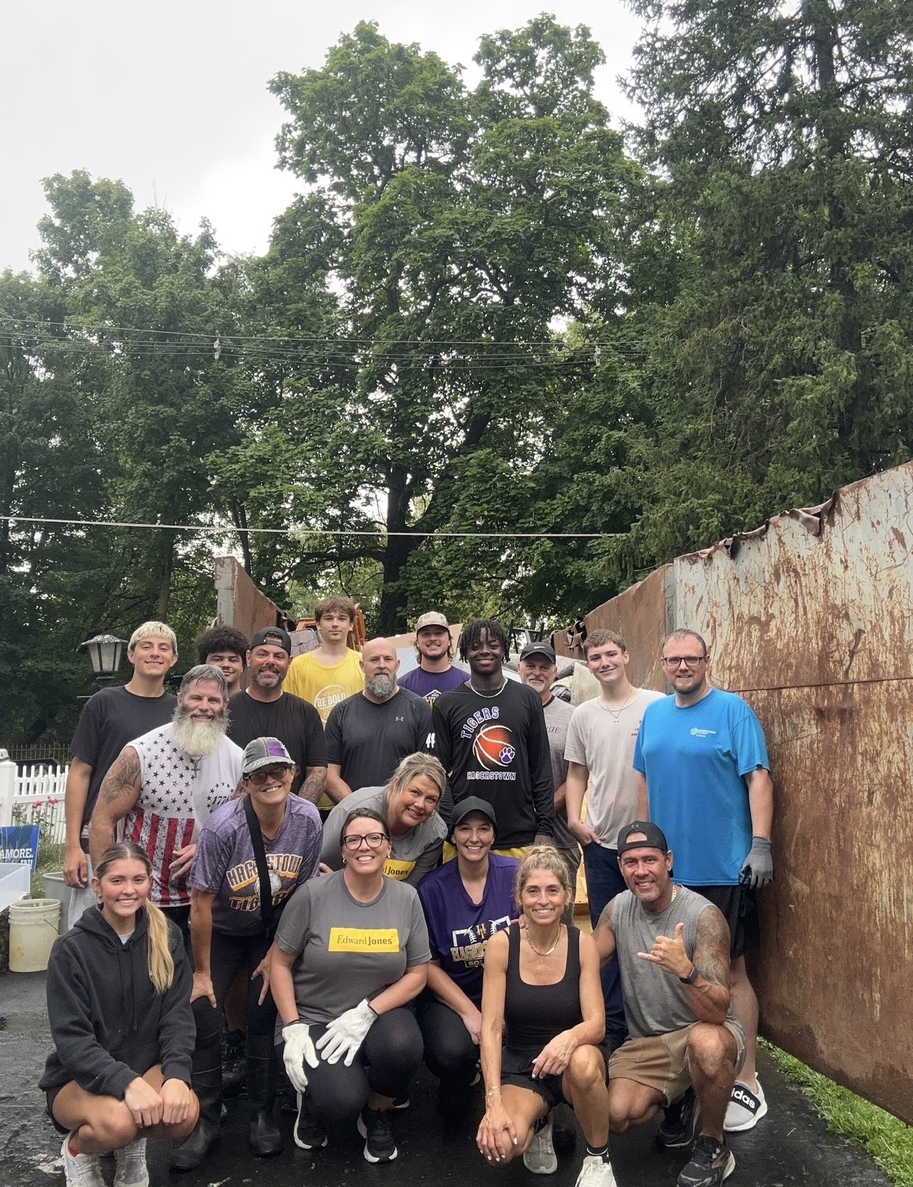 Black and white photograph of a Hagerstown volunteer crew gathered after a community cleanup